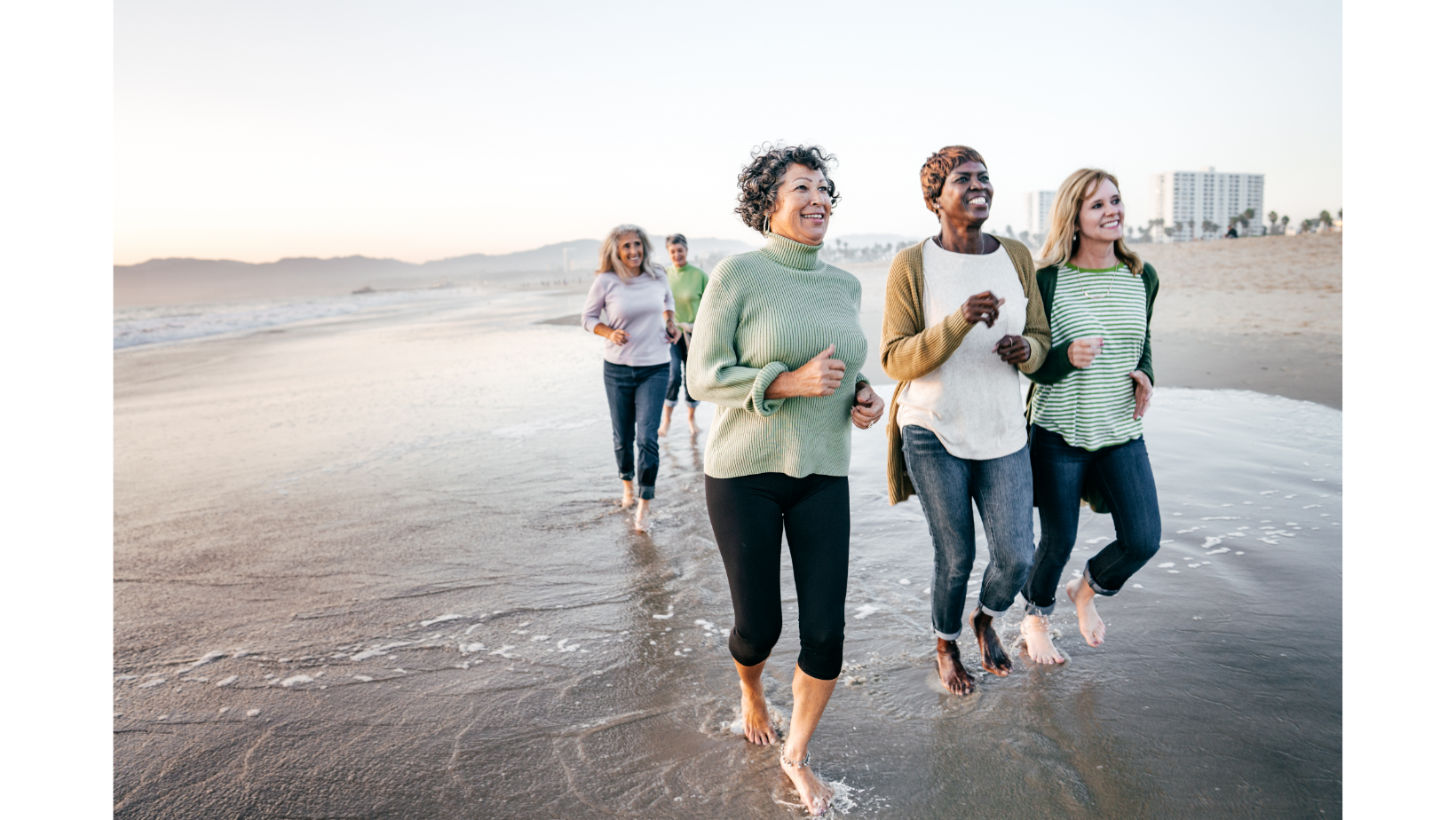 Women running on the beach